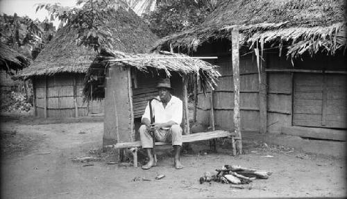 Schwab's interpreter Pepper sitting near fire