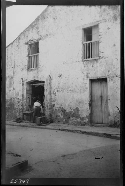 Man in front of building in urban setting