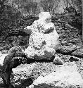 Structure H18; stone figure in front of shrine, south niche