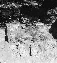 Stucco feet and bench in stairway shrine, Structure Q-97