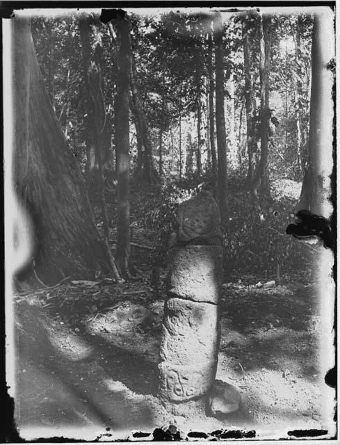 Idol, mound and terrace at ruins east of Uloa River, back view