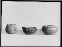 Cache pot and small pots from burial at Poncho House