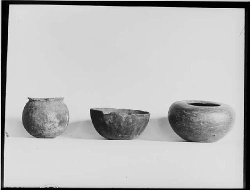 Cache pot and small pots from burial at Poncho House