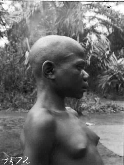 Young, adolescent female, daughter of Marugba, profile view