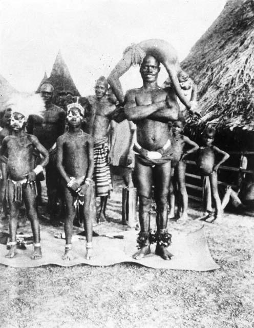 Snake men performing in village