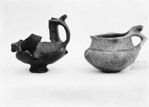 Two broken pottery vessels from grave 3 exacavation