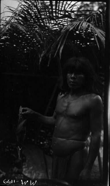 Man standing in jungle