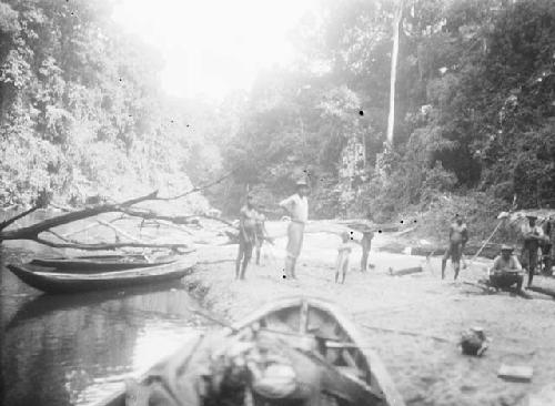 S.M. Hills and Carib on a sand beach