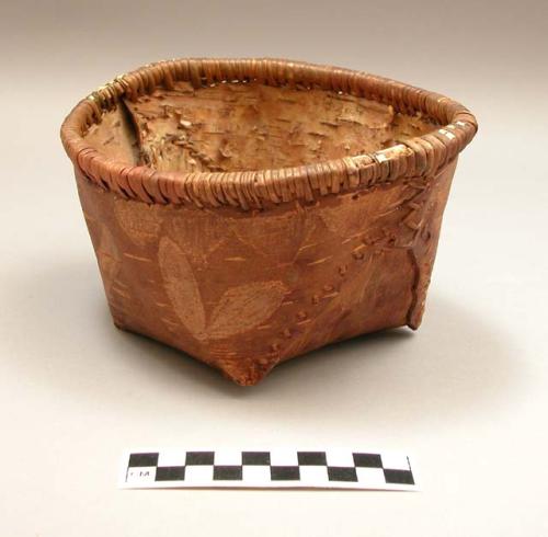 Bark basket with plant and triangle design