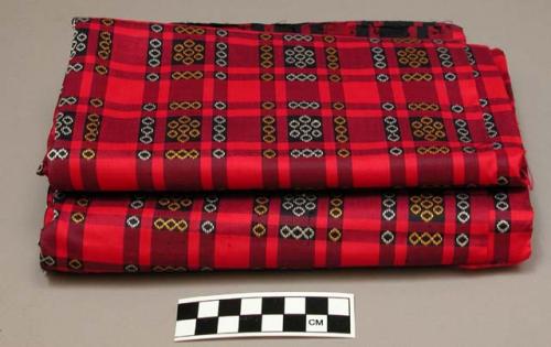 Fabric for woman's longyi;  red with white and yellow circles