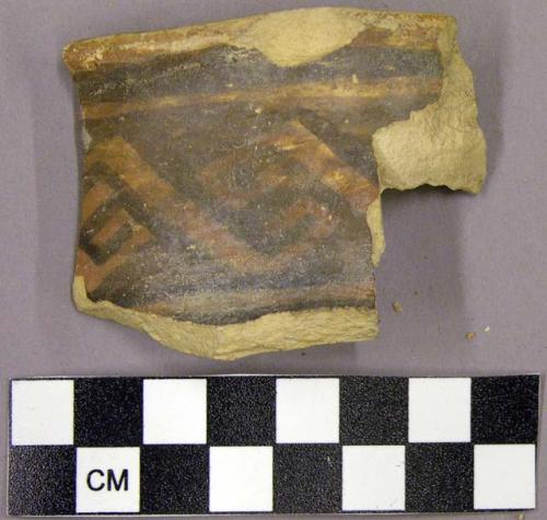 Black on red rim sherd with geometric pattern