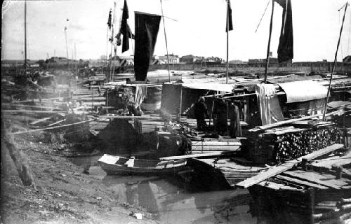 Boats in harbor; titled "Up one of the creeks--New Year's Day"