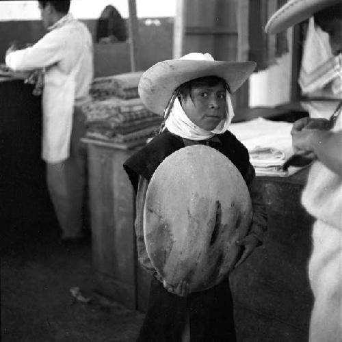 Boy at market