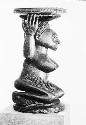 Side view of large Chief's stool with female sculpted form