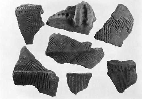 Seven potsherds with incised decoration