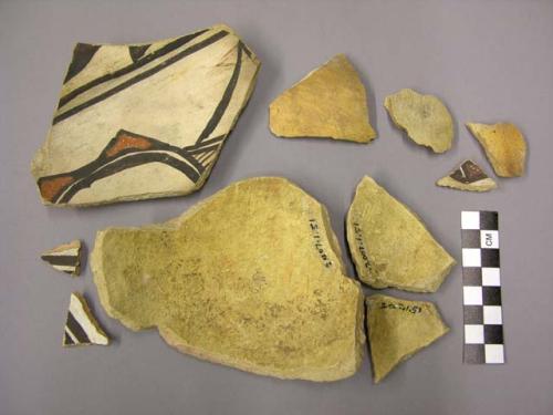 Ceramic sherds, plain or bi- or polychrome, buff ware, three mend together