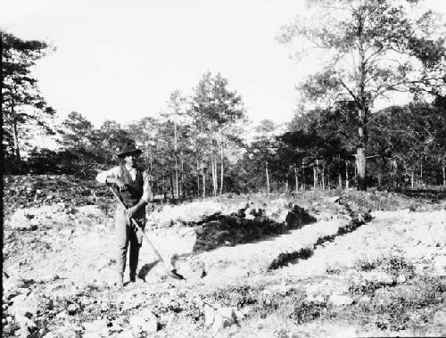 Man cleaning main enclosure