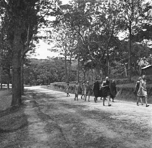 Candidates returning from a circumcision ceremony at Kaimosi