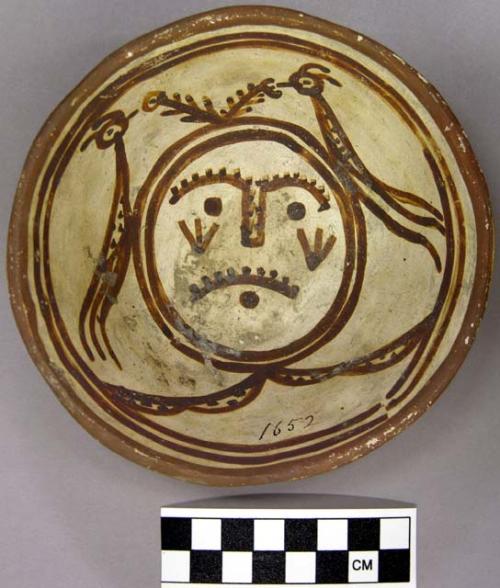 Bowl, polacca polychrome style c. int: clown design; ext: slipped, no design. 5.