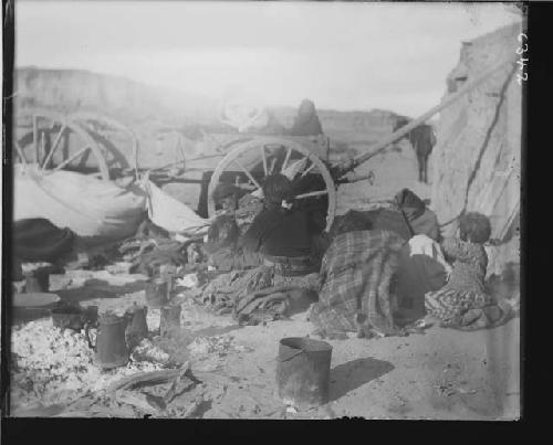 Navajo Woman and Child in front of Cart
