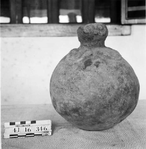 Pottery Jar with Monkey Face on Neck of Vessel