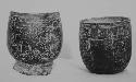 Incised, barrel-shaped vessels (2)