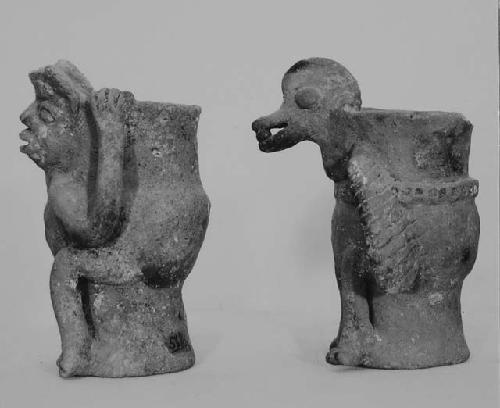 Small pedestal-base effigy vessels (3).