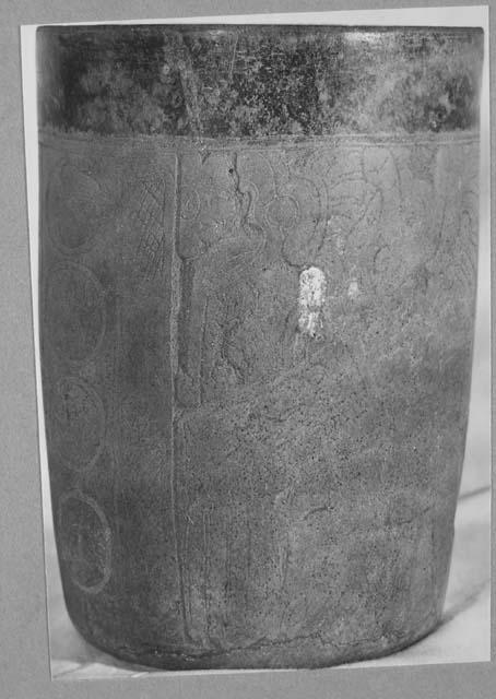 Black ware cylinder- carved & incised decoration