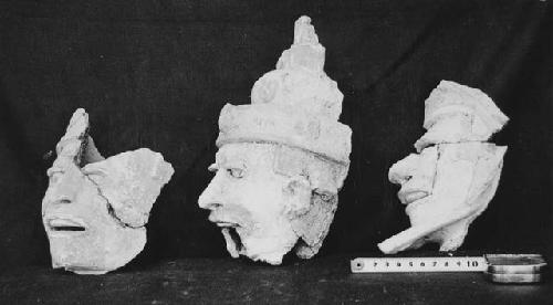 Three effigy incensario heads, Structure R-86; Burial Cist II