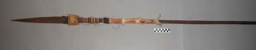 Large spear - wooden shaft slightly carved; broad, carved wooden +