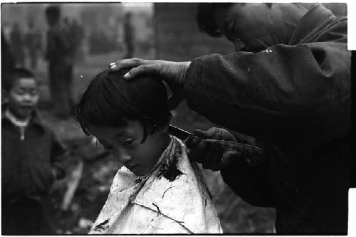 Child getting a haircut