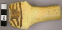 Decorated piece of pottery ladle handle