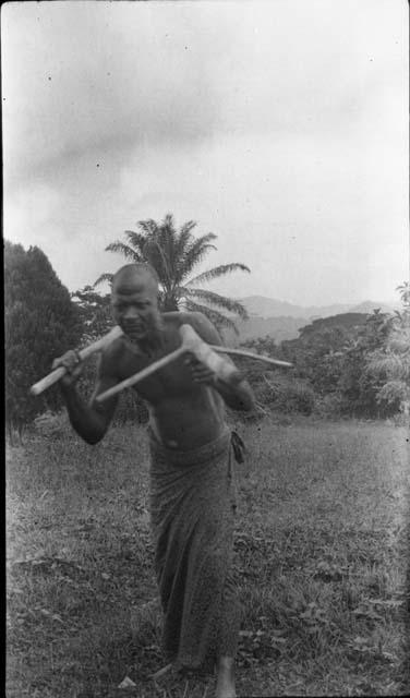 Man demonstrating method of defense