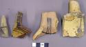 Fragments of decorated pottery ladle handles