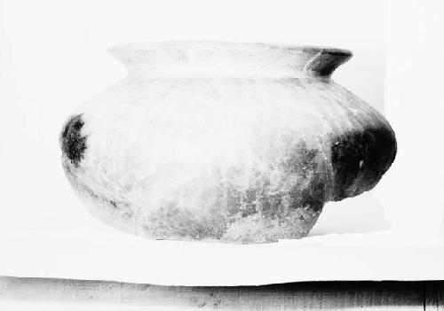 Large red on buff bowl with flaring neck, fragmentary, from Cache 31