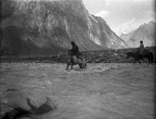 Lower Muzart, two men on horses fording river