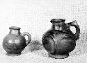 Small modern pottery pitchers showing Spanish influence