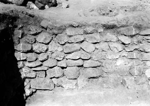 View of excavation site, and shots of artifacts