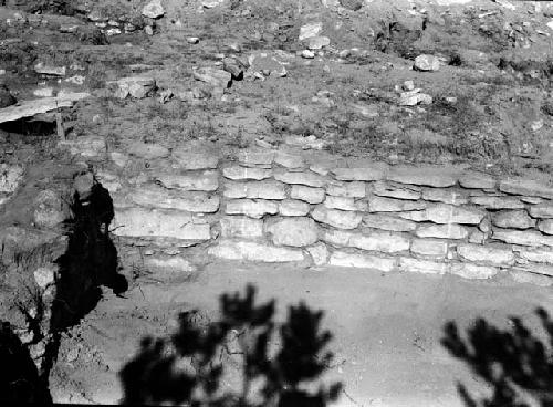 View of excavation site, and shots of artifacts