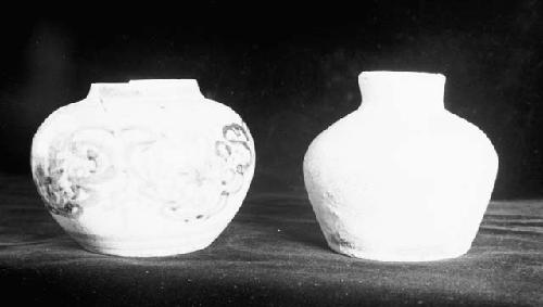 Two pottery jars, one decorated