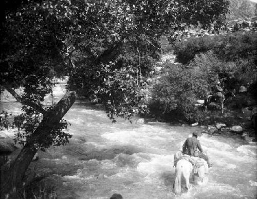 Moses fording side stream of Koksu