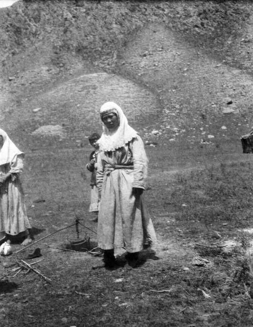 Kazak woman at cooking hole