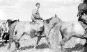 Prince's son mounted on horse