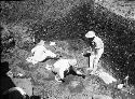 Men digging out excavation pit