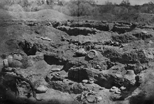 Looking southwest over a part of ruin 3 showing artifacts in situ