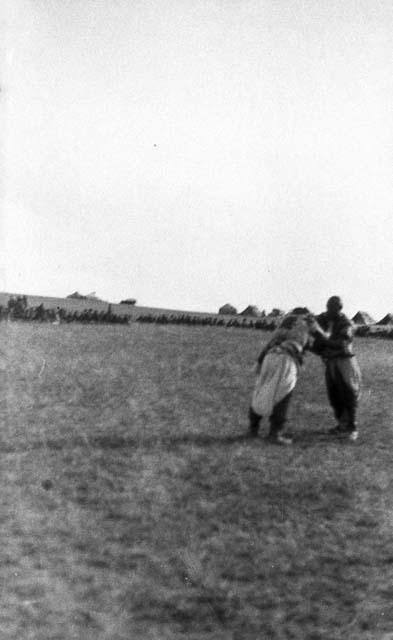 Two men wrestling