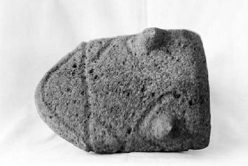 Metate carved as a "sapo" with two feet