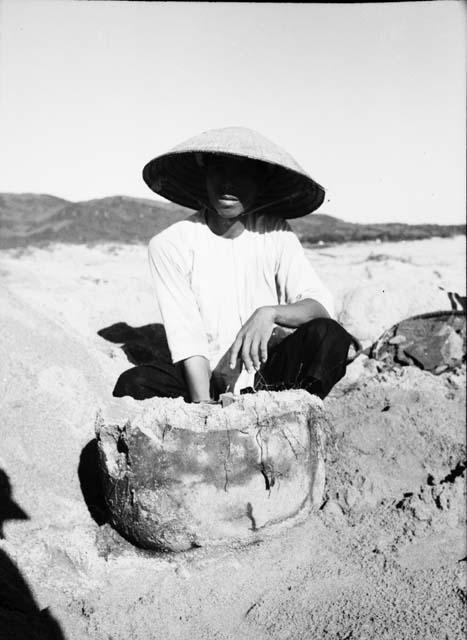 Pottery urn at site