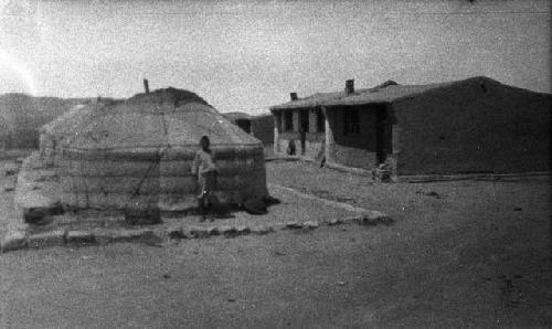 Boy standing in front of Yurt