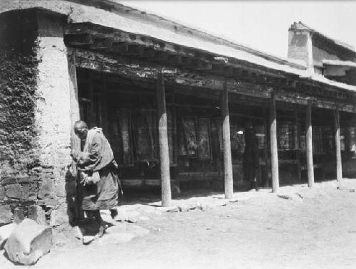 Devout pilgrims turning the prayer wheels